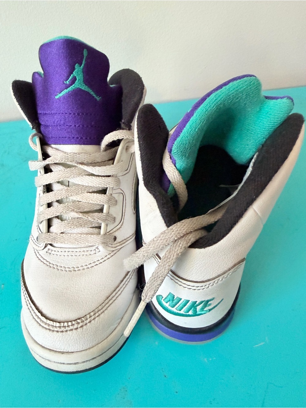 Nike Kids White Sneakers with Purple Tongue & Teal Accents